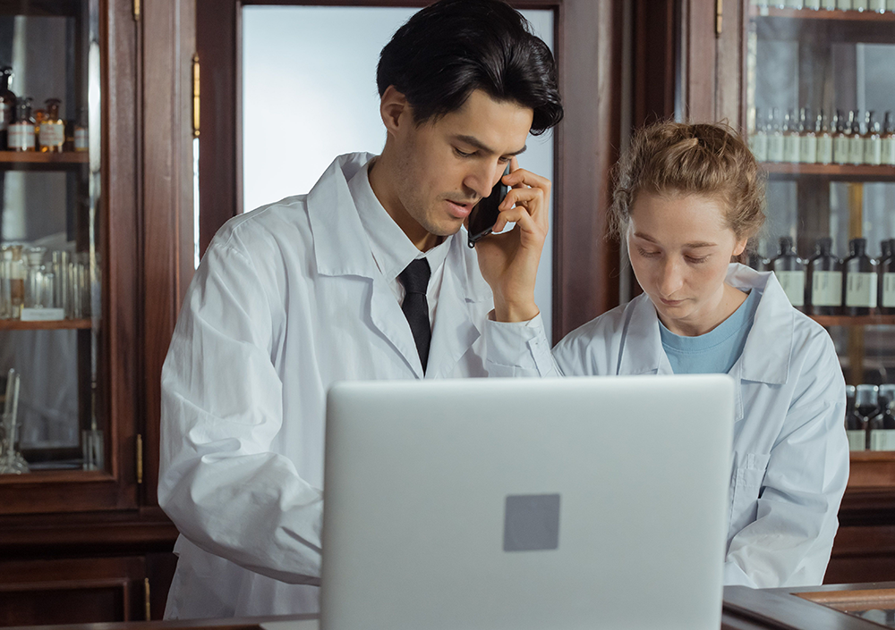 Pharmacists discussing information over the phone