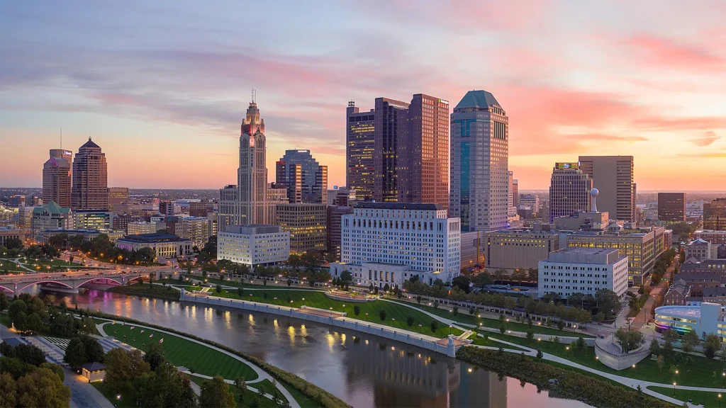Columbus, Ohio skyline along the Scioto River at sunset